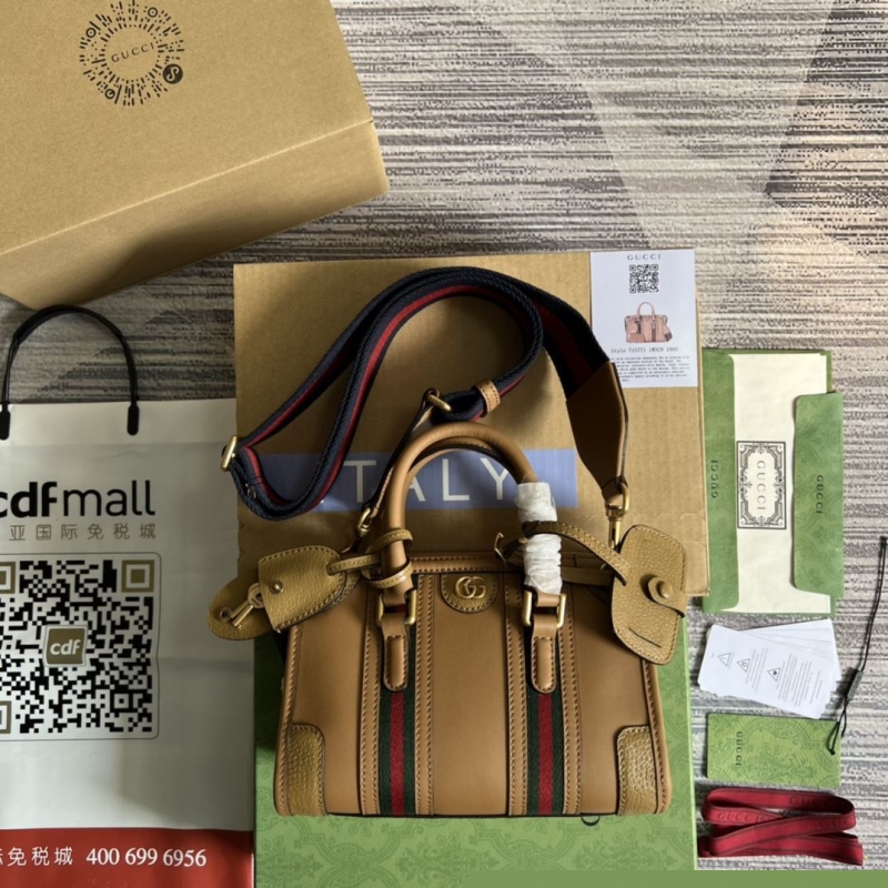 G*u*i top handle bags